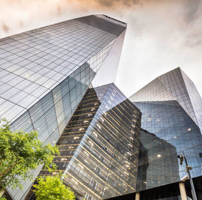 Bowmans office building, a law firm in Sandton seen from below. Sandton houses approximately 300 000 residents and 10 000 businesses, including investment banks, top businesses, financial consultants, the Johannesburg stock exchange and one of the biggest convention centres on the African continent, the Sandton Convention Centre.